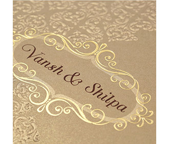 Multfaith Indian wedding card in Simmering brown & embossed floral motifs